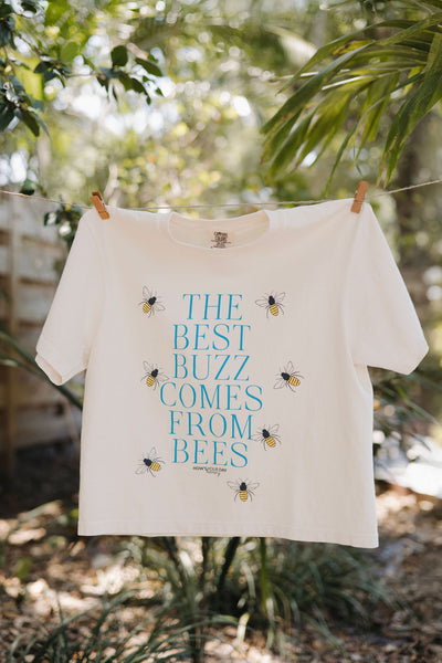 Sustainable beekeeping-themed women's t-shirt featuring 'The Best Buzz Comes From Bees' design, 100% heavyweight ring-spun cotton, bee graphic tee by How’s Your Day Honey.