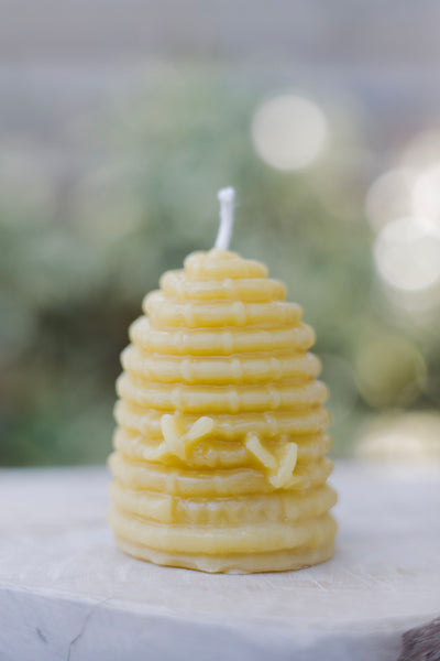 Hand-poured mini beeswax bee skep candle — natural, eco-friendly, clean-burning candle made from rescued bees in St. Petersburg, FL.