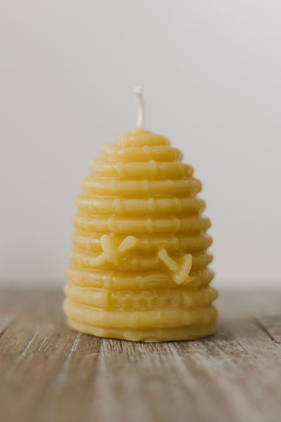 Hand-poured mini beeswax bee skep candle — natural, eco-friendly, clean-burning candle made from rescued bees in St. Petersburg, FL.