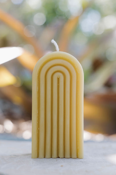 Handmade natural beeswax rainbow candle — eco-friendly, non-toxic, clean-burning décor made in St. Petersburg, FL from rescued bees.