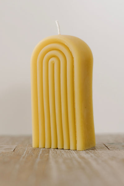 Handmade natural beeswax rainbow candle — eco-friendly, non-toxic, clean-burning décor made in St. Petersburg, FL from rescued bees.