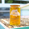 Raw local black mangrove honey from How's Your Day Honey in St. Petersburg FL, one 24oz jar. Photographed on a hive of honey bees.