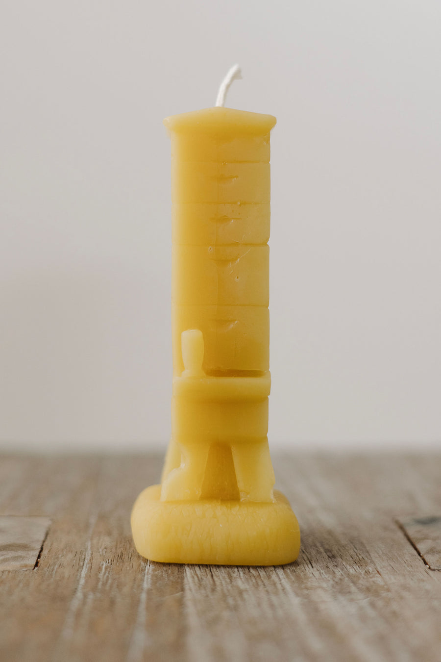 Handcrafted Langstroth beehive beeswax candle — natural, eco-friendly, clean-burning candle made from rescued bees in St. Petersburg, FL.